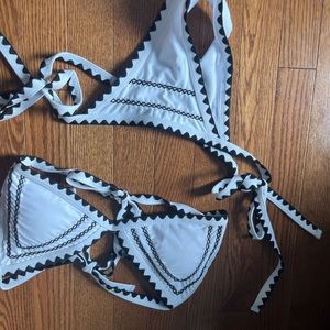 Sunny co. Baiting suit. Originally $100, still has the protection plastic.